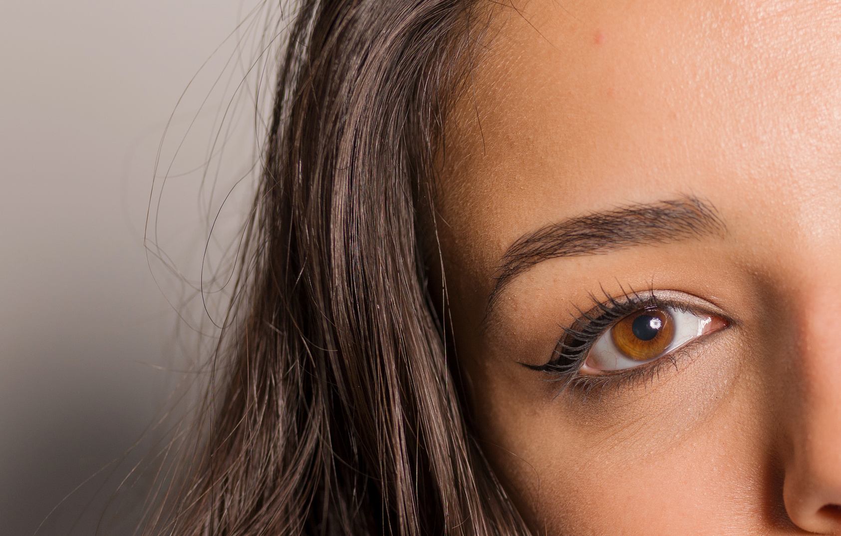 female eye and brow with natural makeup